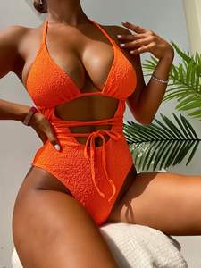 Bikini naranja de una pieza con logotipo personalizado para mujer, venta al por mayor, traje de baño calado de cintura alta, traje de baño con tirantes y cordones sin espalda - Product Image 2