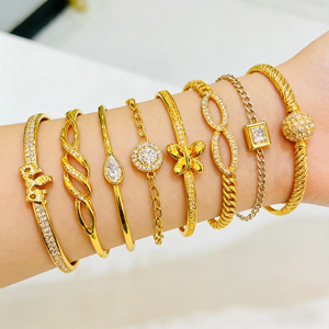 250202 XUPING Gioielli all'ingrosso Bracciale rigido aperto da donna placcato oro 24K, stile indiano, massiccio e fisso - Product Image 1