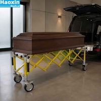 Chariot mortuaire extensible en alliage d'aluminium avec quatre roulettes pivotantes et freins