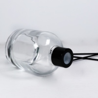 Bouteille en verre transparente ronde vide de 100 ml et 200 ml pour diffuseur de parfum d'ambiance et d'aromathérapie avec bouchon