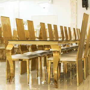 Juego de Mesa y Sillas para Banquetes y Eventos, Diseño de Lujo en Acero Inoxidable, Rectangular, con Cristal Templado Transparente y Patas Doradas - Product Image 1