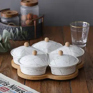 Hot selling ceramic dried fruit plate ins wind snacks melon seeds nuts and cold fruit candy coffee table set creative platter