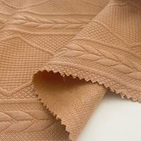 ANONO Nouveau produit Lots excédentaires Polyester Spandex Jacquard tricoté Tissu de sport personnalisé pour vêtements Tissus textiles