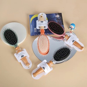 Peigne à cheveux coussiné multicolores 8 cm pour coiffure professionnelle en salon - Product Image 1