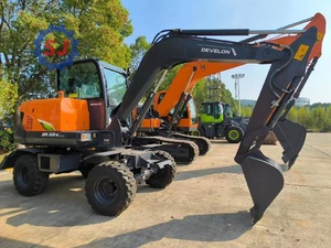 Mini-excavatrice sur roues DEVELON DX60W, équipement de construction compact pour travaux agricoles et de chantier - Product Image 3