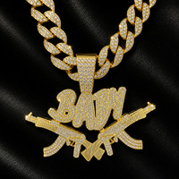 Collier pendentif double pistolet « BABY » en strass dorés audacieux avec chaîne cubaine « Iced Out » pour homme, bijoux de mode Hip Hop Streetwear