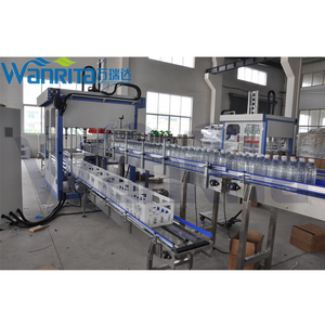 Ligne de conditionnement entièrement automatique Robot 4l Boîte de conserve pour boissons Ramassage et placement de bouteilles enveloppantes <span class=keywords><strong>autour</strong></span> de la machine à emballer les caisses - Product Image 2