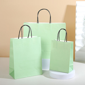 <span class=keywords><strong>Sac</strong></span> en papier kraft brun de luxe avec logo personnalisé imprimé et poignées torsadées pour l'emballage promotionnel de vêtements écologiques - Product Image 3