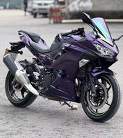 Motocicleta Deportiva de Carreras Ninja de 250cc 400cc, Bicilíndrica en Paralelo, Refrigerada por Líquido, con Inyección Electrónica de Combustible y Frenos ABS