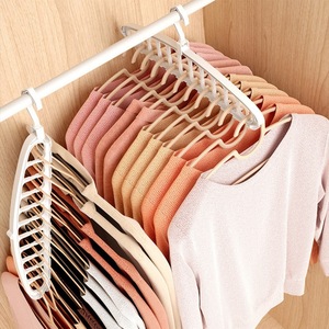Percha giratoria multifuncional de 11 orificios para organizar el armario, con diseño sin marcas y forma rectangular. - Product Image 1