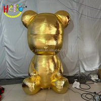 Sculpture géante gonflable en or métallique d'un ours assis, accessoire décoratif pour centre commercial de luxe