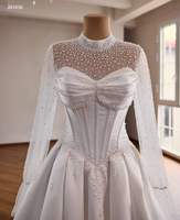 Robe de mariée moderne musulmane Feishiluo avec taille naturelle, manches longues, perles de cristal et traîne chapelle en satin