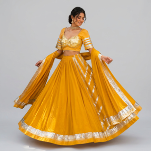 Ensemble Lehenga Choli jaune vif de créateur avec dupatta à bordure Gotta Patti argentée pour la cérémonie Haldi et les occasions festives - Product Image 1