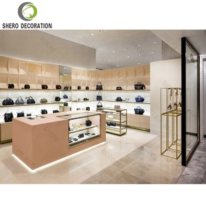 Meuble de magasin de chaussures élégant pour femmes, présentoir mural personnalisé pour sacs à main avec éclairage LED, décoration de magasin de sacs à main - Product Image 1