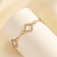 Bracelet trèfle porte-bonheur double face en acier inoxydable plaqué or 18 carats de haute qualité pour femmes Bijoux en acier inoxydable
