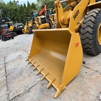 Chargeuse sur pneus CAT 966H robuste pour l'exploitation minière, le stockage de sable, avec une grande benne résistante à l'usure, équipement de chargement stable et efficace