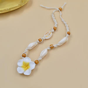 Nouveau design naturel coquille de mer cauri tissé tour de cou mode Hawaii plage Plumeria fleurs perles de bois tressé déclaration collier - Product Image 4