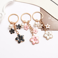 Mini porte-clés tendance en émail avec perles et fleurs pour clé de voiture, cadeau pour femmes et hommes, pendentif de sac à main, accessoires de bijoux DIY