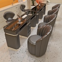 Table de manucure de luxe capitonnée à bulles avec plateau en marbre, éclairage LED et tiroirs pour salon de beauté