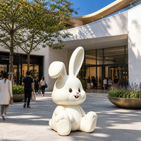 Sculpture en résine et fibre de verre de lapin mignon de dessin animé, décoration de jardin extérieure personnalisée, pour zone touristique, rue commerciale et parc.