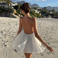 Robe mini dos nu en mousseline tissée blanche écologique pour femme, style licou, fluide et ample, sans manches, idéale pour les vacances d'été à la plage ou comme tenue de villégiature