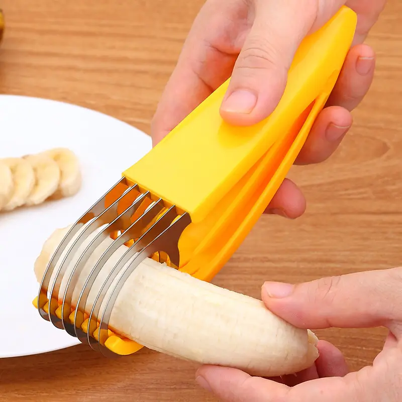 Cortador de frutas e banana, atacado quente mãos livres e conveniente utensílios de cozinha artefato manual cortador de frutas