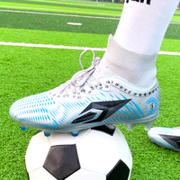 Chaussures de football d'été personnalisées en gros à prix abordable, à tige haute, semelle intermédiaire en EVA, semelle extérieure en PVC, unisexe