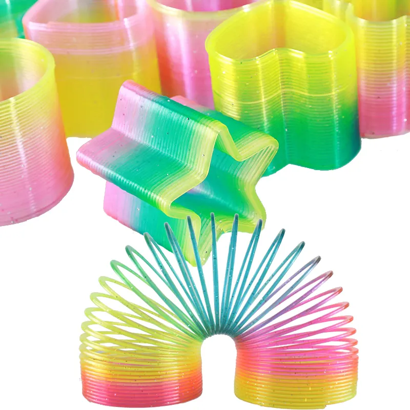 La bobina della molla dell'arcobaleno magico morbido all'ingrosso della fabbrica gioca i giocattoli di educazione precoce del regalo dei bambini bobine dell'arcobaleno della molla magica