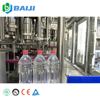 Ligne de production entièrement automatique de pasteurisation, d'embouteillage, de remplissage et de bouchage de jus de fruits en bouteilles PET