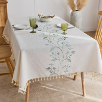 Nappe à pompon brodée de style chinois moderne nouveau tissu tissé floral pour les tables basses décoratives pour la maison moderne