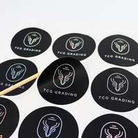 Autocollants personnalisés en papier cuivre avec impression noire et feuille holographique argentée pour bouteilles en verre