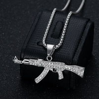Collier à breloques personnalisé hip hop en acier inoxydable plaqué or 18 carats avec strass et diamants AK 47 pendentif pistolet pour homme