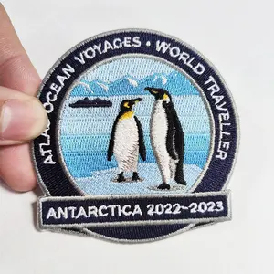 Personalizzazione all'ingrosso del modello di pinguino da 3 pollici ferro su supporto patch ricamate