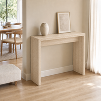 Table console en MDF avec surface en placage à motif travertin, design rectangulaire pour couloir et pieds en panneaux, idéale pour l'entrée.
