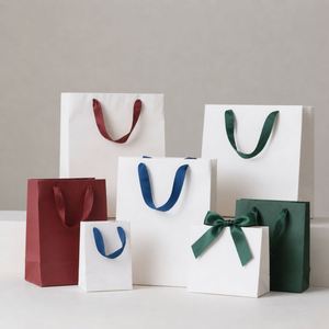 Custom Foil Logo Luxury Blue Shopping Paper <b>Bag</b> High Quality Laminated Boutique Clothing Gift <b>Bags</b> with Handle for Retail Shop - Product Image 1
