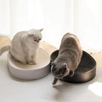 Accessoires pour animaux de compagnie 2026 – Lit-griffoir ovale noir et blanc en carton ondulé de haute qualité pour chat – Vente en gros