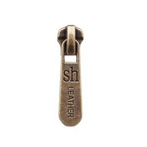 Tùy chỉnh túi phần cứng Kim Loại Logo puller Antique Brass Áo khoác kim loại dây kéo thanh trượt - Product Image 1