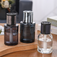 Diffuseur de parfum d'ambiance de luxe en verre cylindrique pour aromathérapie, avec bouchon, diffuseur suspendu pour voiture, vente en gros