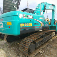 Excavatrice hydraulique sur chenilles d'occasion de 20 tonnes, de fabrication japonaise, Kobelco SK200D, pour démolition et travaux de renforcement.