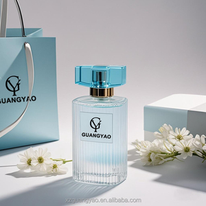 Flacon de parfum rayé bleu clair 50ml 100ml Flacon de parfum vide avec vaporisateur Boîte d'emballage personnalisée Flacon de parfum OEM - Product Image 2