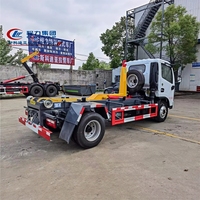Camion de transfert de déchets municipal détachable Cheng Liwei 4x2 avec bras de ramassage à crochet et bras droit, pour la collecte des déchets