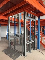 Ascenseur de fret vertical fixe industriel, élévateur hydraulique de marchandises avec système de protection de sécurité complet