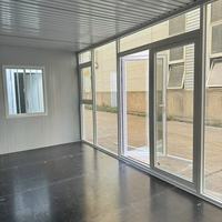 Maison préfabriquée en conteneur à ossature métallique avec parois vitrées pour bureaux, chambres, appartements, maisons, hôtels et villas