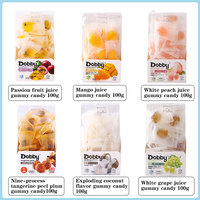 Bonbons gélifiés Dobby Juicy Candy Q-Ball saveur mangue, pêche blanche, fraise, raisin
