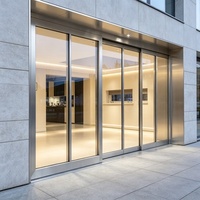 Porte coulissante en aluminium à rupture de pont thermique, robuste, en verre, approuvée par la mairie de Miami-Dade, pour patio résidentiel moderne américain et hall d'entrée de centre commercial