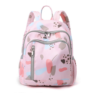 Mini mochila con estampado de dibujos animados para mujeres y niñas, ligera, impermeable, de tela Oxford, bolsa de viaje escolar con bolsillos delanteros con cremallera - Product Image 5