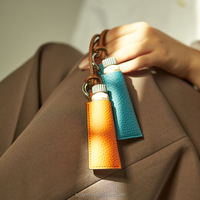 Étui de luxe personnalisé en cuir PU élégant pour parfum, baume à lèvres et rouge à lèvres, pochette cosmétique, sac pendentif
