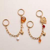 Bijoux fantaisie, chaîne en or, porte-clés, accessoires avec breloques en perles de cœur remplaçables, breloque pour sac pour femmes