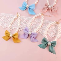 Collier pour animaux de compagnie direct d'usine petit chat chien cloche collier accessoires rétro accessoires de perles