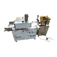 Diviseur de pâte pneumatique Boules de fromage faisant la machine Fabricant d'Aaruul personnalisé Machine à boules de Laddu